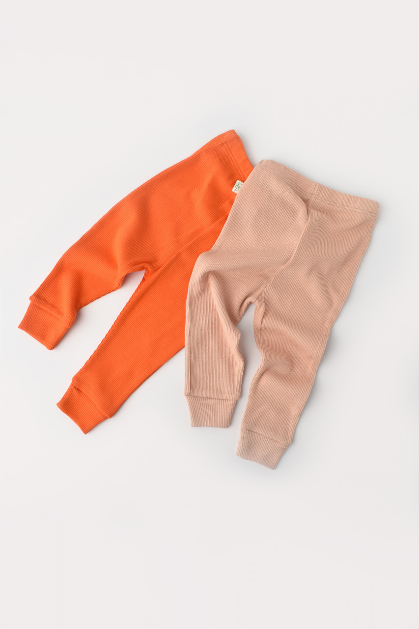 set-2-pantaloni-bebe-unisex-din-bumbac-organic-si-modal-rodie-piersica5761 Set 2 Baby Unisex nadrág, organikus és modális pamutból - gránátalma/őszibarack, babycosy (méret: 6-9 hónap) - Kép 1